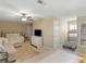 Bonus room with a daybed, a treadmill, and a sofa at 1466 Lake Forest Ln, Mcdonough, GA 30253