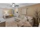 Bonus room with desk, sofa, rug, and a large decorative tree at 1466 Lake Forest Ln, Mcdonough, GA 30253