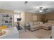 A bonus room with a daybed, a sofa, a desk, and an exercise bike at 1466 Lake Forest Ln, Mcdonough, GA 30253