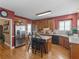 Well-appointed kitchen featuring ample cabinetry, modern appliances, and convenient breakfast bar seating at 1466 Lake Forest Ln, Mcdonough, GA 30253