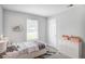 Cozy bedroom with a cute shelf and plenty of storage at 4448 Denise Dr, Decatur, GA 30035