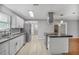 Large kitchen with stainless steel appliances and a large island offering a large countertop at 4448 Denise Dr, Decatur, GA 30035