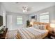 Serene main bedroom with neutral tones, soft lighting, and a large window at 4448 Denise Dr, Decatur, GA 30035