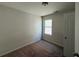 Bedroom featuring carpet and one window at 6474 Grey Fox Way, Riverdale, GA 30296