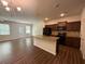 Modern kitchen featuring a center island and sleek appliances at 6474 Grey Fox Way, Riverdale, GA 30296