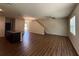 Spacious living room with hardwood floors and lots of natural light at 6474 Grey Fox Way, Riverdale, GA 30296