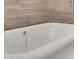 Close up of a elegant, modern soaking bathtub with chrome faucet fixtures at 867 Peachtree Ne St # 202, Atlanta, GA 30308