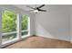 Bedroom with hardwood floors, a ceiling fan and plenty of natural light at 867 Peachtree Ne St # 202, Atlanta, GA 30308