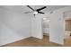Bedroom featuring hardwood floors, closet, and access to en-suite bathroom and walk-in closet at 867 Peachtree Ne St # 202, Atlanta, GA 30308