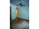 View of a bedroom, with hardwood floors and an ensuite bathroom at 867 Peachtree Ne St # 202, Atlanta, GA 30308