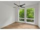 Bedroom with hardwood floors, a ceiling fan and an abundance of natural light at 867 Peachtree Ne St # 202, Atlanta, GA 30308