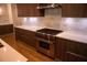 Modern kitchen with stainless steel range, white countertops and marble backsplash at 867 Peachtree Ne St # 202, Atlanta, GA 30308