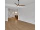 Open-concept living area with hardwood flooring leading to kitchen and dining area at 867 Peachtree Ne St # 202, Atlanta, GA 30308