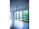 Bright, spacious living room with hardwood floors and expansive windows at 867 Peachtree Ne St # 202, Atlanta, GA 30308