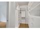 Custom closet with white shelving and drawers for organized storage at 867 Peachtree Ne St # 202, Atlanta, GA 30308