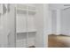 Built-in shelving and hanging rods maximize space in this walk-in closet at 867 Peachtree Ne St # 202, Atlanta, GA 30308