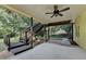 Back porch leads to a multi-tiered deck and landscaped backyard at 1885 Milfield Cir, Snellville, GA 30078
