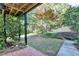 View of the well-maintained yard from the covered back patio at 1885 Milfield Cir, Snellville, GA 30078