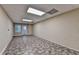 Finished basement featuring large windows, neutral walls, tiled flooring, and recessed lights at 1885 Milfield Cir, Snellville, GA 30078