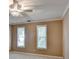 Bedroom featuring neutral walls, plush carpet, crown molding and a ceiling fan with lighting at 1885 Milfield Cir, Snellville, GA 30078