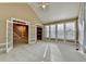 Open living room with vaulted ceiling and plenty of light at 1885 Milfield Cir, Snellville, GA 30078