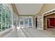 Sunroom featuring large windows and glass doors providing plenty of sunlight at 1885 Milfield Cir, Snellville, GA 30078