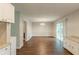 Inviting dining area featuring modern flooring, a stylish chandelier, and sliding glass doors at 2499 Shiloh Dr, Decatur, GA 30034