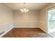 Bright dining room featuring modern flooring, ample space, and a sliding glass door at 2499 Shiloh Dr, Decatur, GA 30034