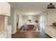 Staged dining area featuring modern flooring, a stylish table, and sliding glass doors at 2499 Shiloh Dr, Decatur, GA 30034