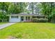 Charming one-story home featuring a well-maintained lawn and inviting curb appeal at 2499 Shiloh Dr, Decatur, GA 30034