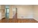 Open living area featuring modern flooring and a view into the kitchen and hallway at 2499 Shiloh Dr, Decatur, GA 30034