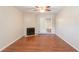 Comfortable living room with hardwood floors and a door to another room at 2499 Shiloh Dr, Decatur, GA 30034