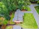 An aerial view of a house showcasing landscaping and a well-manicured lawn at 3843 Lake Se Dr, Smyrna, GA 30082