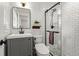 Modern bathroom with a glass-enclosed shower, white subway tile, and contemporary vanity at 3843 Lake Se Dr, Smyrna, GA 30082