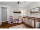 Charming Bedroom with a crib, colorful decor, and storage shelves, creating a playful space at 3843 Lake Se Dr, Smyrna, GA 30082