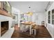 Bright dining area showcasing a dining table, and flows into a modern kitchen at 3843 Lake Se Dr, Smyrna, GA 30082