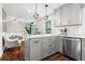 Bright kitchen featuring white countertops, stainless steel appliances, and globe pendant lights over the island at 3843 Lake Se Dr, Smyrna, GA 30082