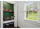 Cozy office nook featuring natural light, built-in shelving, and comfortable seating at 3843 Lake Se Dr, Smyrna, GA 30082