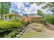 The backyard has an expansive yard at 402 Johannah Sw Pl, Lilburn, GA 30047