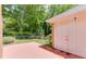 The backyard has a large concrete patio, a storage shed, and a privacy fence at 402 Johannah Sw Pl, Lilburn, GA 30047
