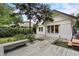 Charming backyard featuring a wooden deck, lush greenery, and a white brick exterior at 622 Seminole Ne Ave, Atlanta, GA 30307