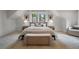 Bedroom featuring stylish decor, a comfortable bed, and windows with natural light at 622 Seminole Ne Ave, Atlanta, GA 30307
