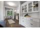 Bright kitchen features stainless appliances, white cabinets, and an eat-in breakfast nook at 622 Seminole Ne Ave, Atlanta, GA 30307