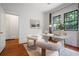 Bright office space features stylish furniture and decor with a view outside at 622 Seminole Ne Ave, Atlanta, GA 30307