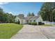 Ranch style house with well maintained driveway and lawn at 742 Redland Dr, Jonesboro, GA 30238