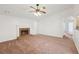 Alternate view of the Living Room featuring a brick fireplace and entry to a hallway at 742 Redland Dr, Jonesboro, GA 30238