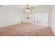Spacious living room with a view of the kitchen, dining room, and a vaulted ceiling at 742 Redland Dr, Jonesboro, GA 30238