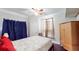 Cozy bedroom with hardwood floors, ceiling fan, and closet at 117 Joseph E Lowery Nw Blvd, Atlanta, GA 30314