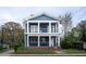 Charming two-story home with a spacious front porch and upper balcony offers classic curb appeal at 117 Joseph E Lowery Nw Blvd, Atlanta, GA 30314