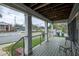 Inviting front porch featuring sturdy pillars, providing an outdoor seating area with neighborhood views at 117 Joseph E Lowery Nw Blvd, Atlanta, GA 30314